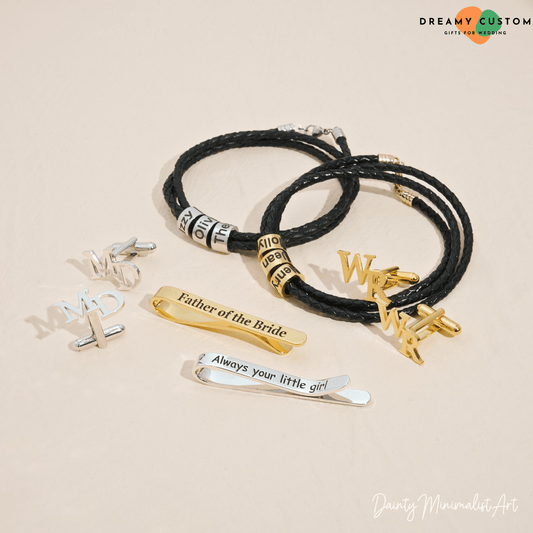 A collection of elegant personalized accessories, including engraved cufflinks, braided leather bracelets, and custom tie clips. Thoughtful and stylish keepsakes perfect for weddings and special occasions.