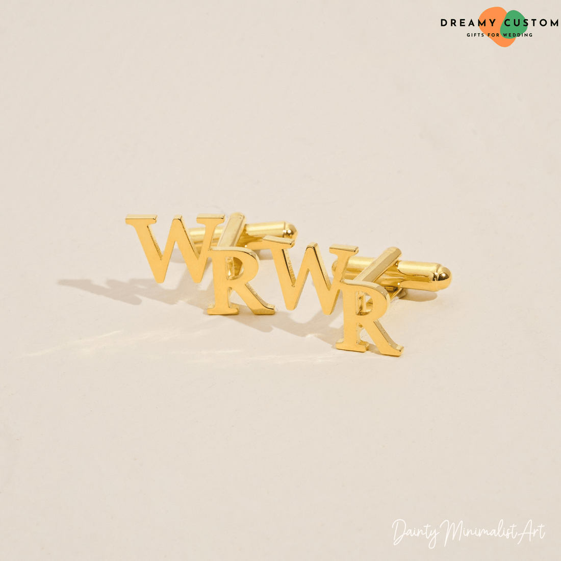 Elegant gold personalized cufflinks featuring custom initials, a timeless and sophisticated accessory for grooms and groomsmen. A perfect finishing touch for a wedding or special occasion.