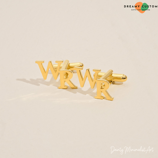 Elegant gold personalized cufflinks featuring custom initials, a timeless and sophisticated accessory for grooms and groomsmen. A perfect finishing touch for a wedding or special occasion.