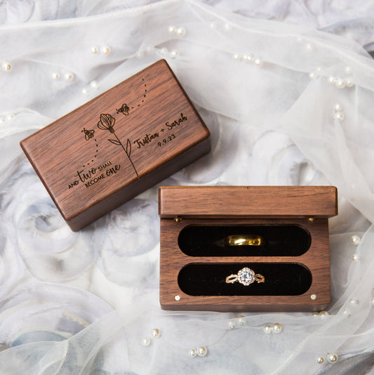 A custom wooden ring box engraved with a personal message, perfect for preserving your rings in style. This elegant box is ideal for weddings, adding a touch of rustic charm and lasting beauty to your special moments.