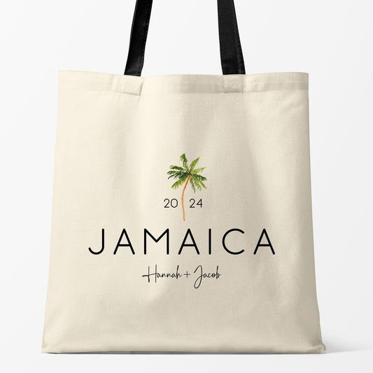 Personalized beach tote bag with palm tree design, featuring 'Jamaica 2024' for destination wedding.
