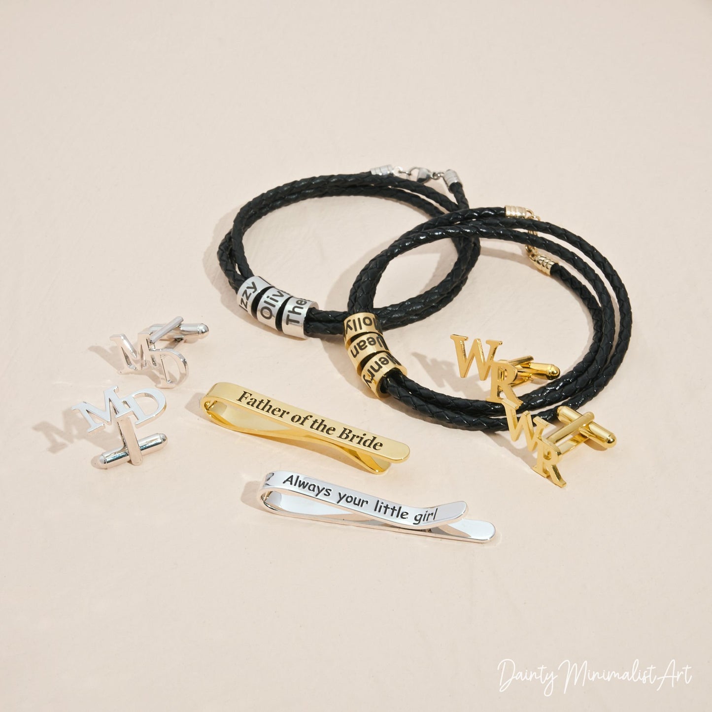 A collection of personalized cufflinks and bracelets in gold and silver.