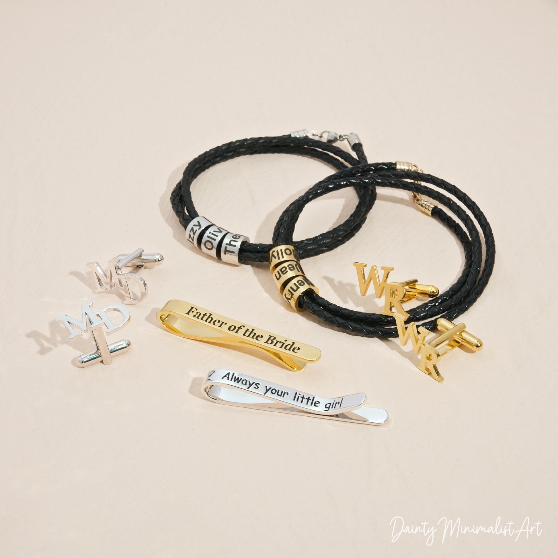 A collection of personalized cufflinks and bracelets in gold and silver.