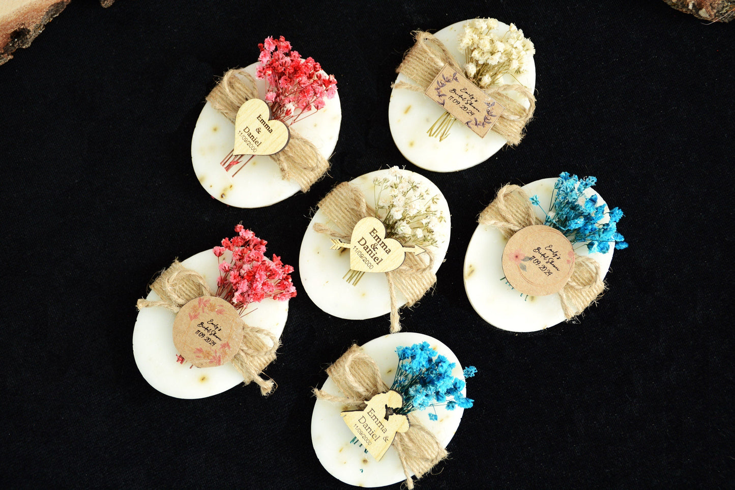 Soap wedding favor multi-box display, decorated with red, white, and blue flowers, featuring Emma and Daniel wooden tags