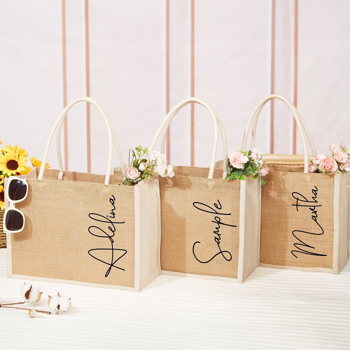 Personalized burlap tote bags with names Adeline, Sample, and Martha for weddings or special events.