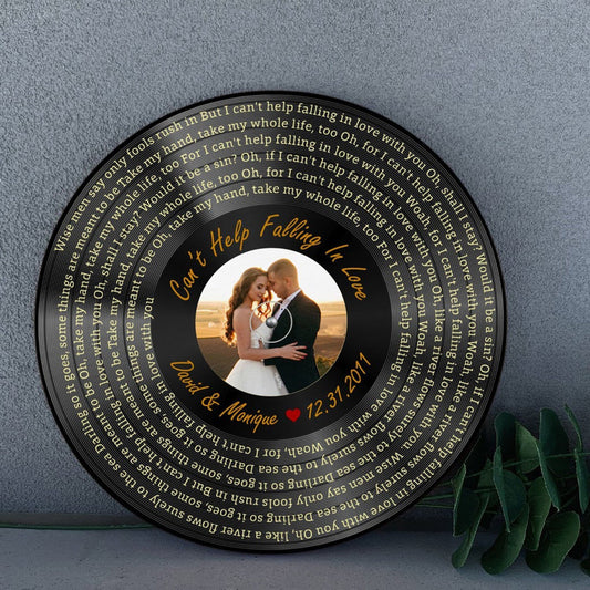 Custom song plaque featuring "Can't Help Falling in Love" with personalized names and wedding date. Perfect anniversary or wedding gift.