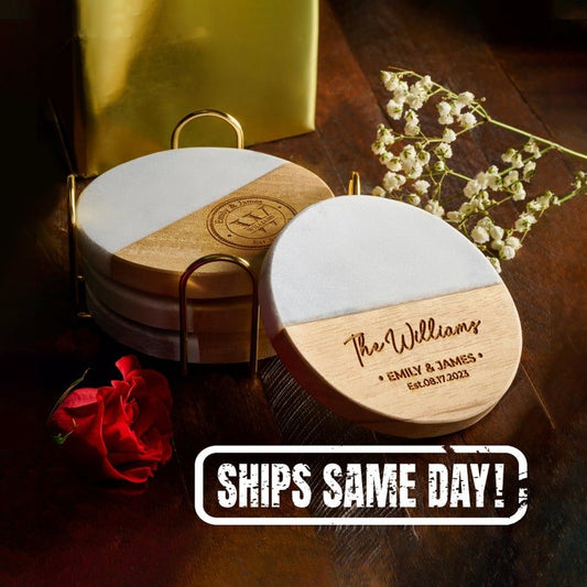 Personalized marble coaster set with engraved names and date, featuring a wood and marble design.