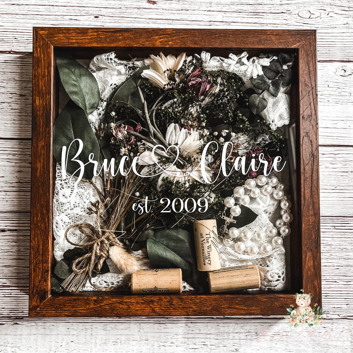 Personalized wedding shadow box with dried flowers, pearls, and custom name engraving