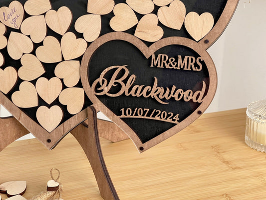 Personalized wooden heart bridal guest book with custom engraving, perfect for modern and traditional weddings