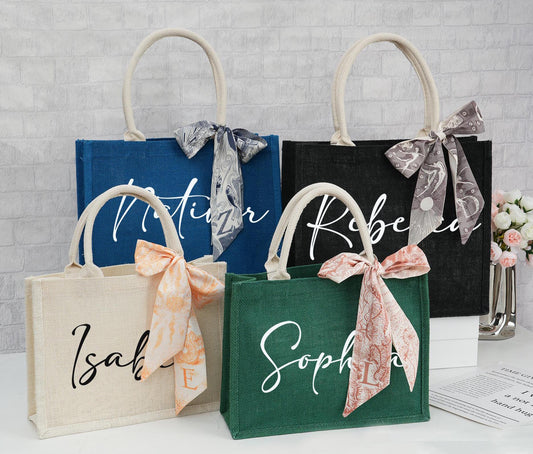Bridesmaid gift idea – white custom burlap tote bags with names like “Sophie”, “Olivia”, “Natalie” in stylish fonts.
