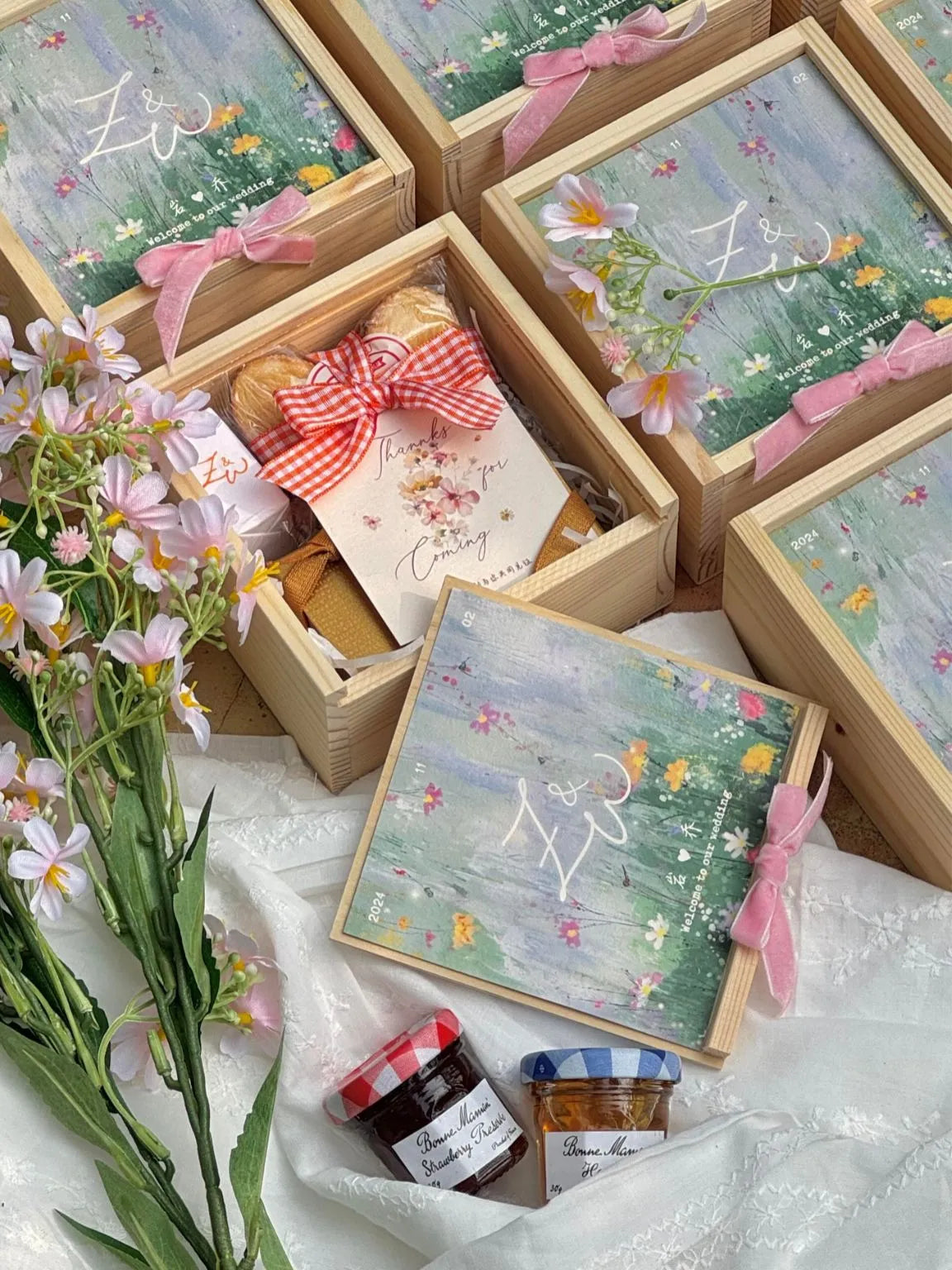 DreamyCustom personalized wedding gifts, featuring custom wooden gift boxes with floral designs, a 