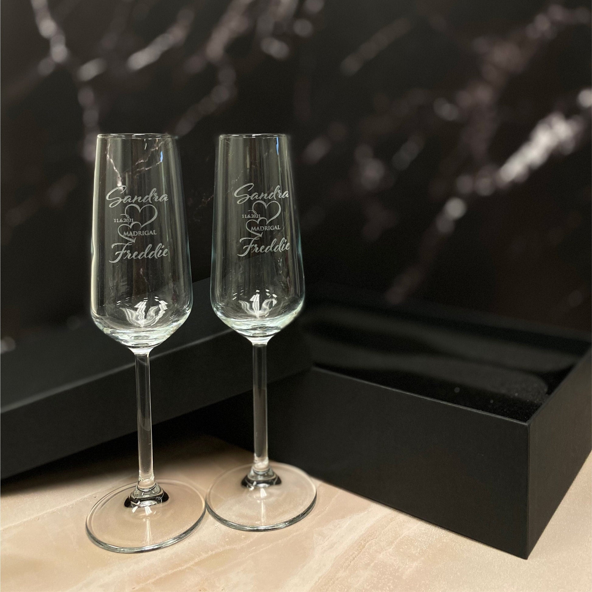 Personalized champagne flute set with gift box packaging, ideal for weddings