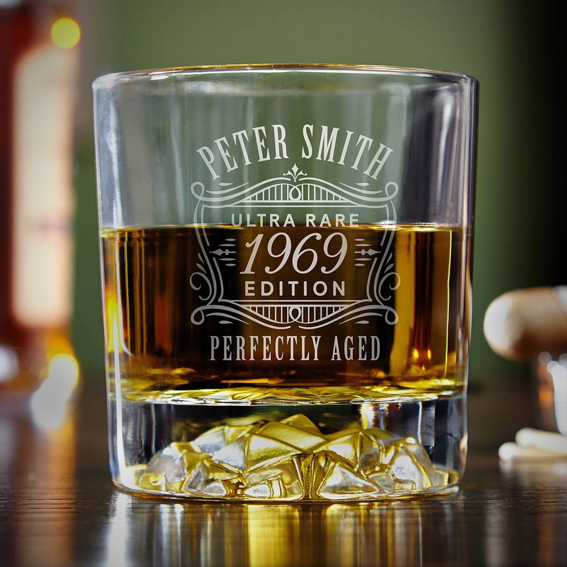 Whiskey glass with intricate "Ultra Rare 1969" engraved design, ideal for special occasions and milestone celebrations.