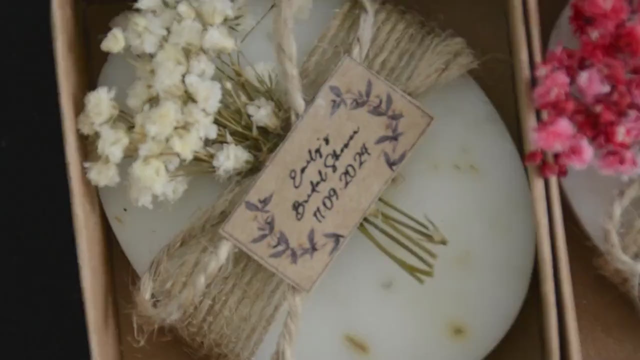 Soap wedding favor video showcasing red, white, and blue flower decorations, packaged in boxes with Emma and Daniel wooden tags, perfect for wedding parties