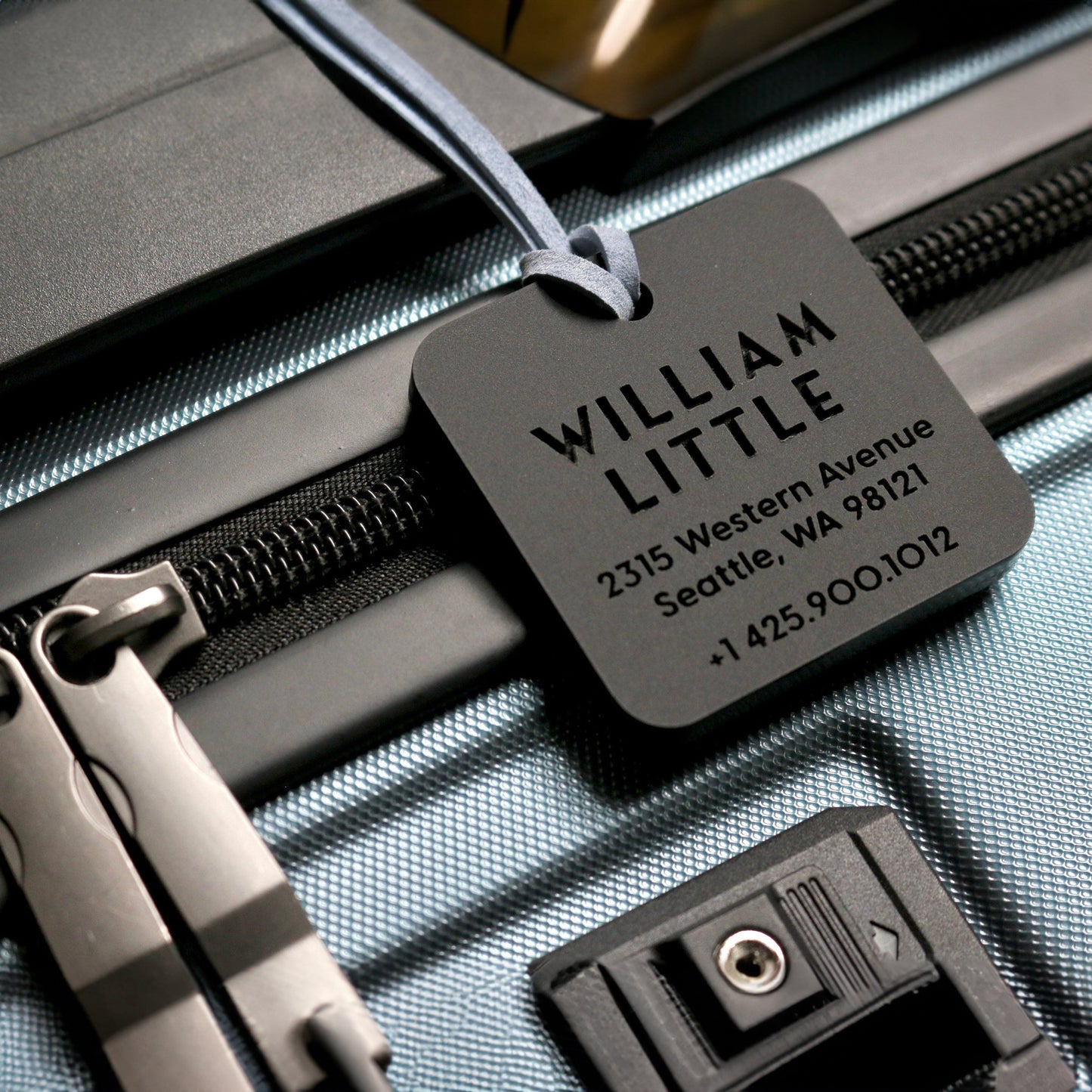 custom-engraved-luggage-black-tags