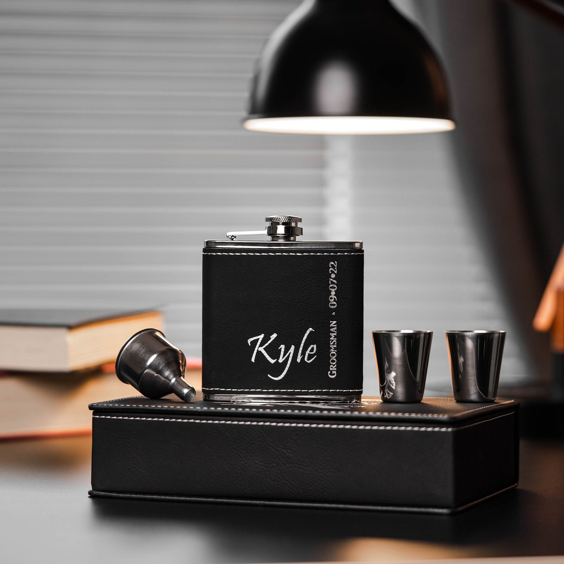 black-flask-with-kyle-and-groomsman-engraved-in-white-