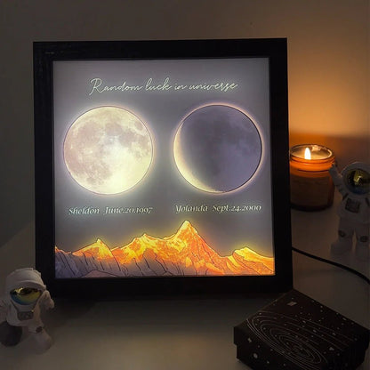 Aesthetic moon phase LED frame illuminating a cozy night setting.