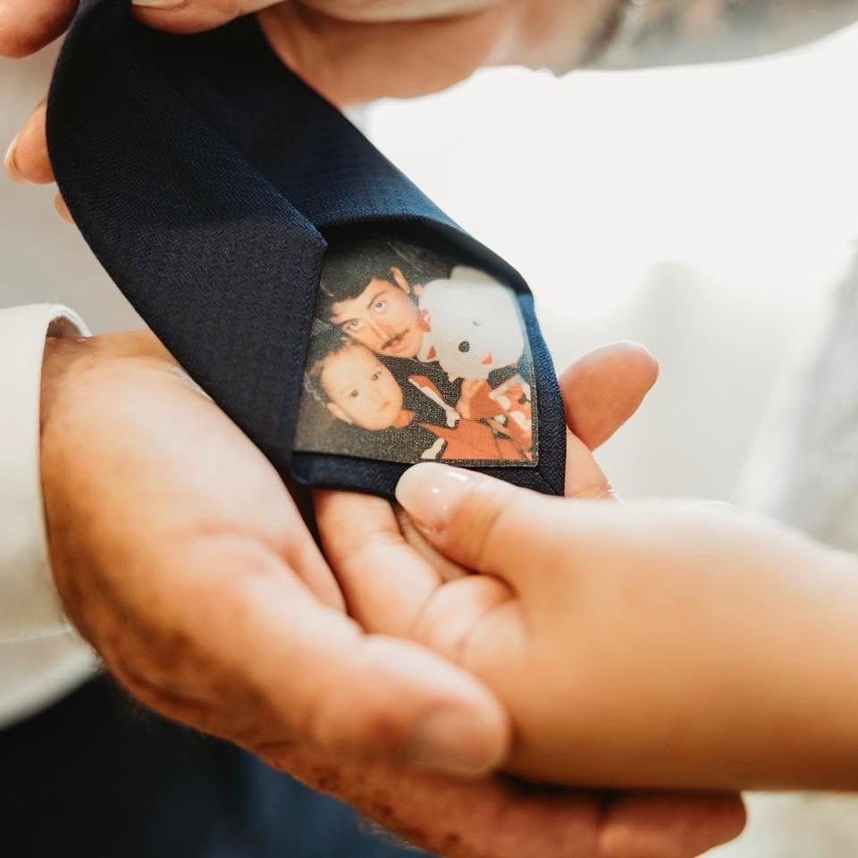 Custom Photo Tie Patch: A tie with a patch showing a father, child, and teddy bear.