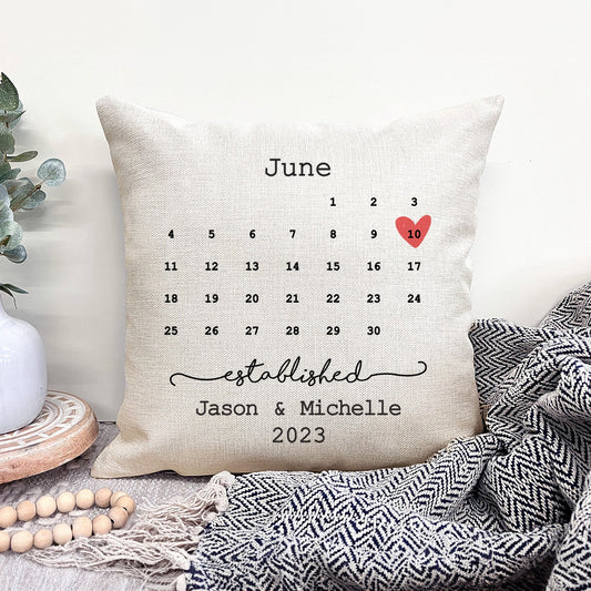 Personalized wedding pillow with calendar design and heart accent, perfect for commemorating a wedding date.