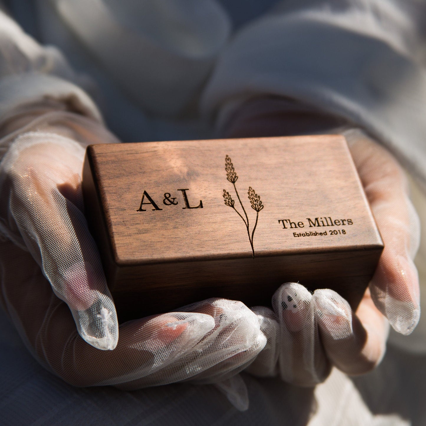 Personalized wooden ring box with custom engraving on lid